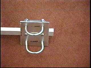 Clamping antenna to mast